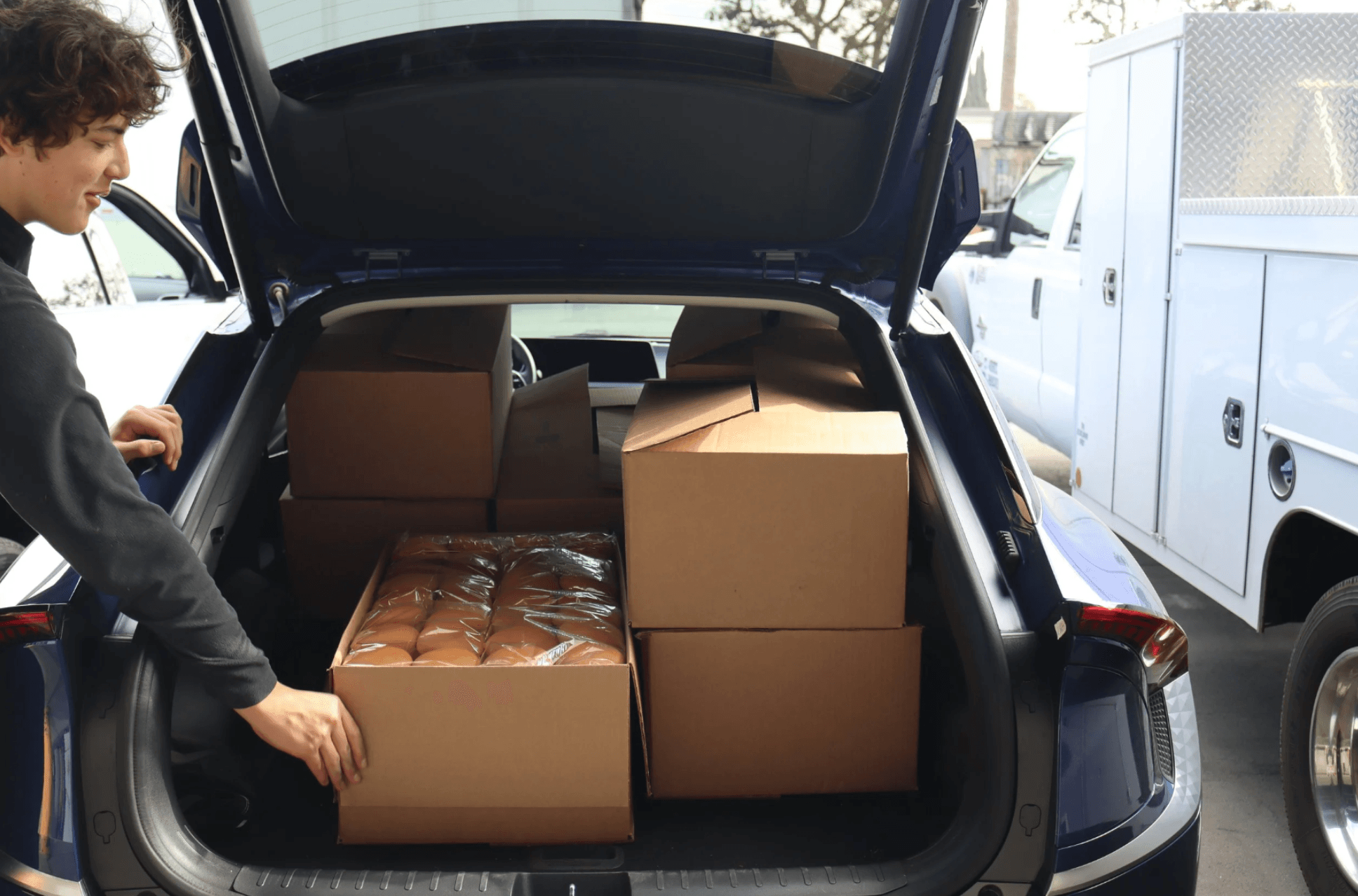 Car loaded with bread deliveries