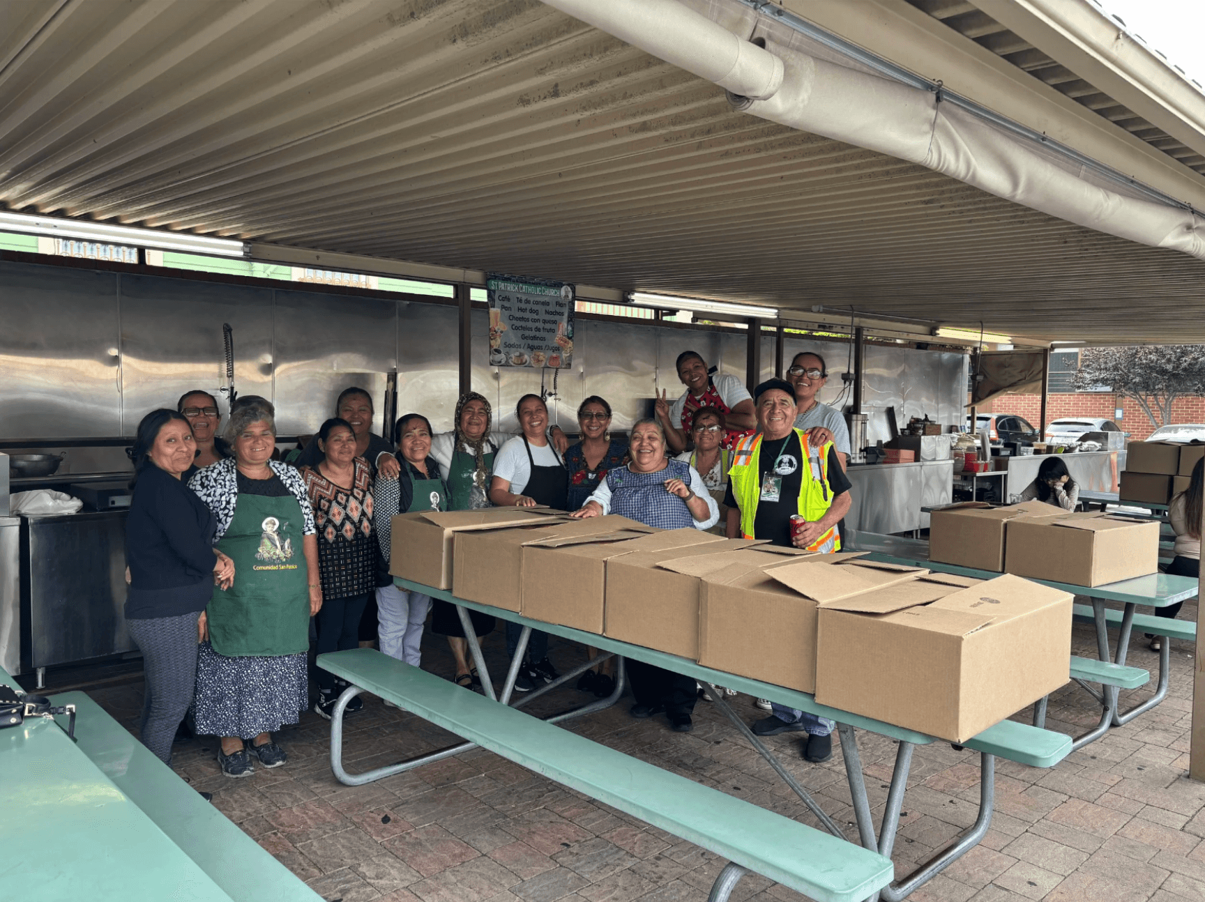 Shelter staff receiving bread donation from KneadLA